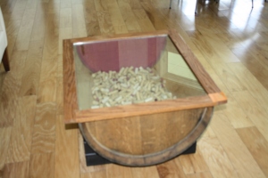This great table was made by an employee of Pollack.  It is a wine barrel split in half, filled up with corks.  If only I had an extra $500 lying around, it could be mine!