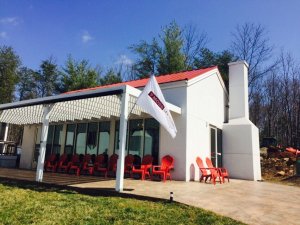The Moss tasting rooms. Those red chairs are a great place to take in one of the best views in Virginia.